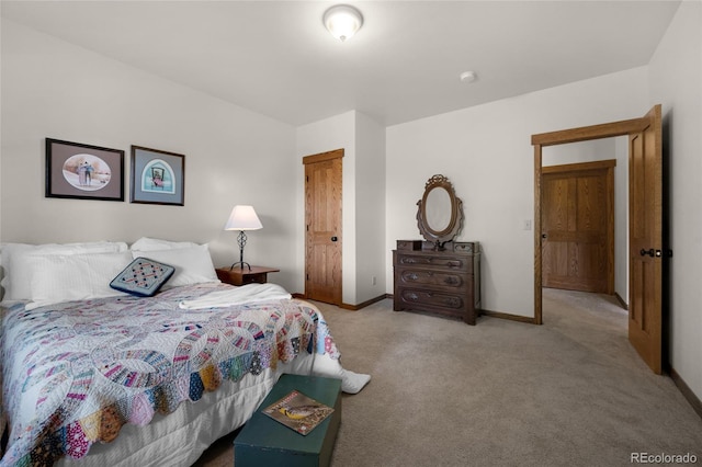 carpeted bedroom featuring a closet