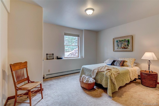 carpeted bedroom with baseboard heating