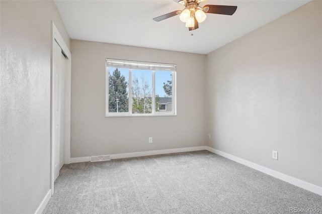 4623 S Kalispell Way, Aurora, CO 80015 - unfurnished bedroom featuring carpet flooring, a closet, baseboards, and a ceiling fan
