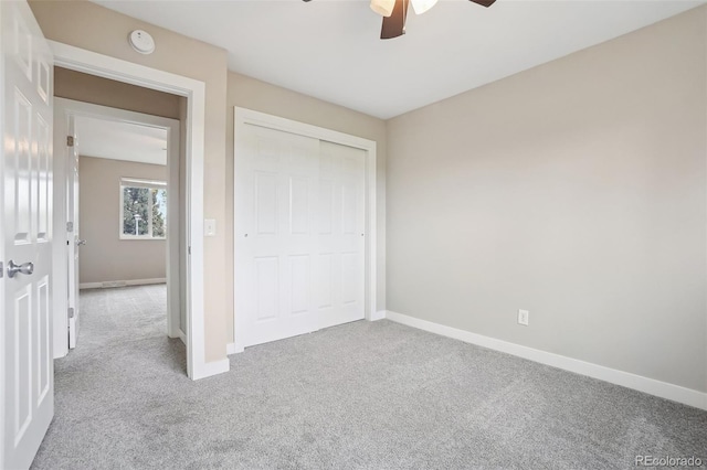 4623 S Kalispell Way, Aurora, CO 80015 - unfurnished bedroom featuring carpet flooring, baseboards, a closet, and a ceiling fan