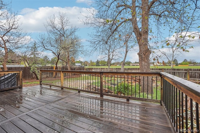 4623 S Kalispell Way, Aurora, CO 80015 - wooden terrace featuring a fenced backyard