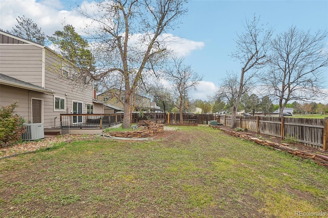 4623 S Kalispell Way, Aurora, CO 80015 - view of yard featuring a wooden deck and cooling unit
