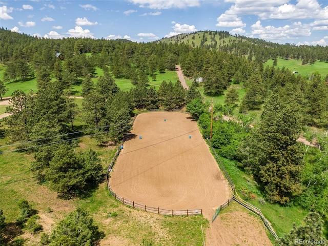 89 Aspen Leaf Ln, Bellvue, CO 80512 - bird's eye view of a heavily wooded area and a mountain backdrop