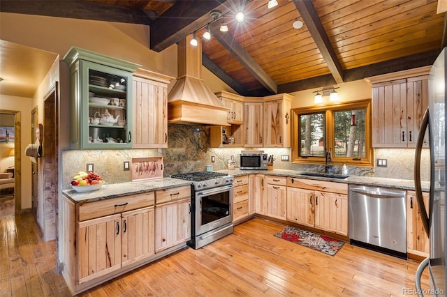 89 Aspen Leaf Ln, Bellvue, CO 80512 - kitchen with stainless steel appliances, light brown cabinets, wood ceiling, light wood-style floors, and light stone counters