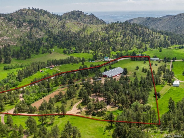 89 Aspen Leaf Ln, Bellvue, CO 80512 - aerial overview of property's location featuring property parcel outlined and a mountain backdrop