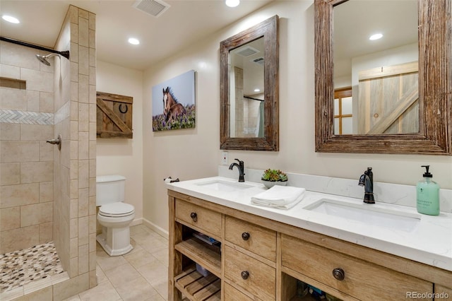 89 Aspen Leaf Ln, Bellvue, CO 80512 - full bath featuring double vanity, tiled shower, tile patterned floors, and recessed lighting