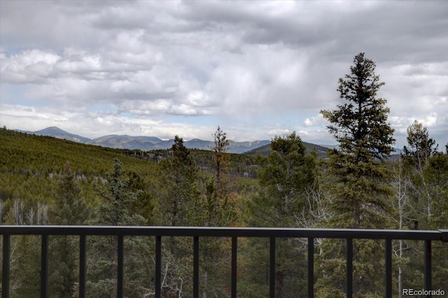 view of mountain feature featuring a wooded view