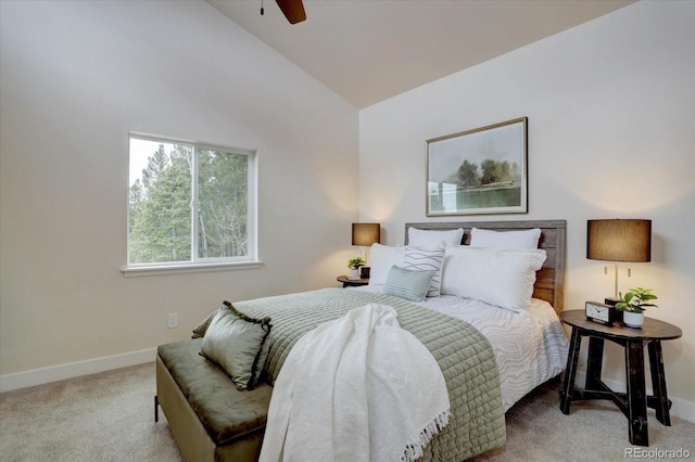 carpeted bedroom featuring a ceiling fan, baseboards, and lofted ceiling