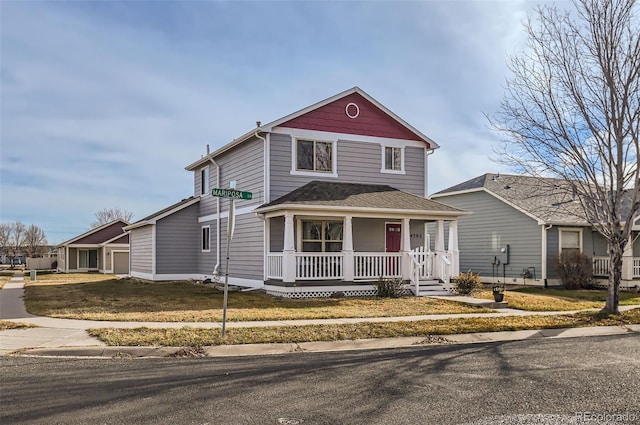 view of front facade with a porch and a front yard