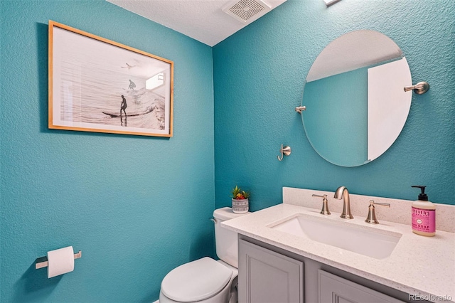 6713 W 98th Cir, Westminster, CO 80021 - bathroom featuring vanity and a textured wall