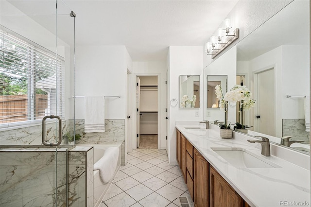 6713 W 98th Cir, Westminster, CO 80021 - full bath featuring a bath, double vanity, and a shower stall
