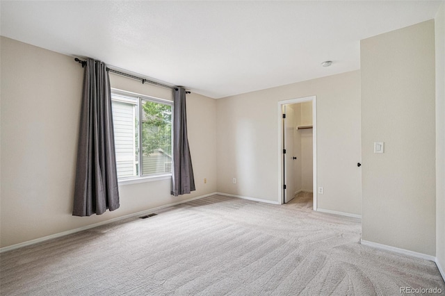 6713 W 98th Cir, Westminster, CO 80021 - empty room with light colored carpet and baseboards