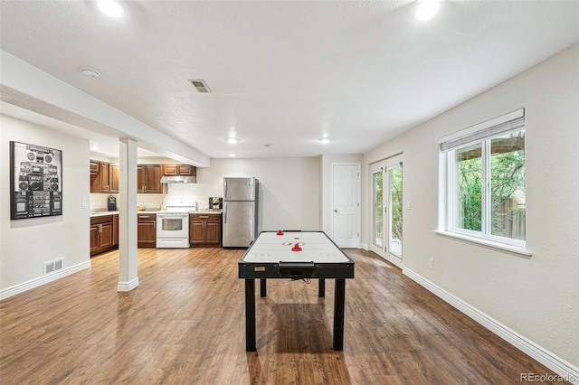 6713 W 98th Cir, Westminster, CO 80021 - game room with wood finished floors