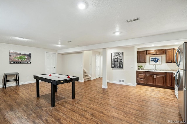 6713 W 98th Cir, Westminster, CO 80021 - game room featuring wood finished floors and recessed lighting