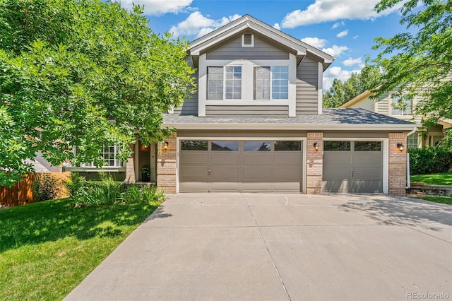 6713 W 98th Cir, Westminster, CO 80021 - traditional-style home featuring brick siding, concrete driveway, and a shingled roof