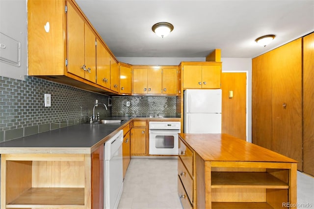 kitchen featuring white appliances, dark countertops, a sink, open shelves, and backsplash