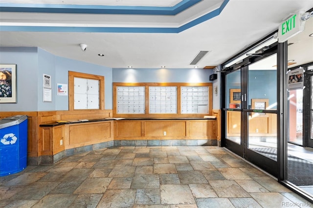 reception area featuring visible vents and mail area