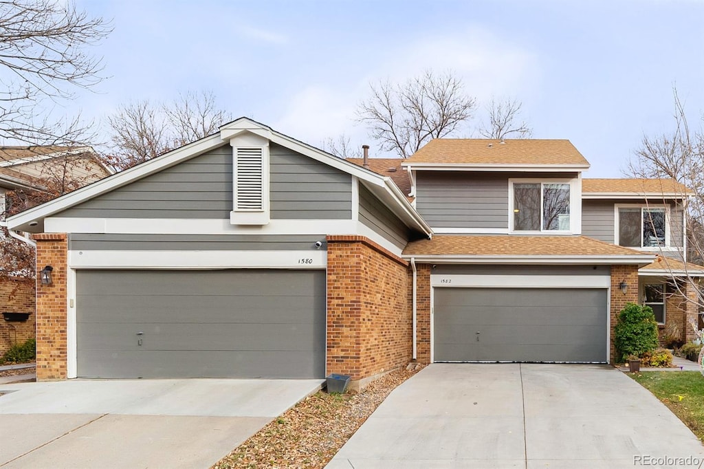 view of front of property featuring a garage