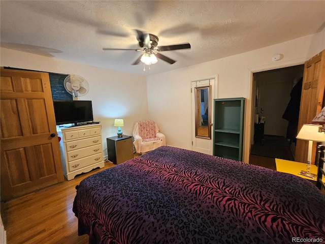232 N 14th St, Colorado Springs, CO 80904 - bedroom with wood finished floors and ceiling fan