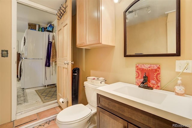232 N 14th St, Colorado Springs, CO 80904 - bathroom with toilet, vanity, and tile patterned flooring