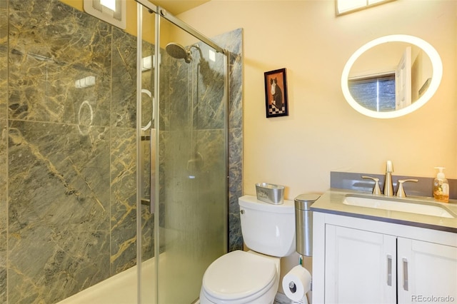 232 N 14th St, Colorado Springs, CO 80904 - bathroom featuring toilet, a stall shower, and vanity
