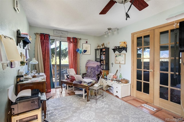 232 N 14th St, Colorado Springs, CO 80904 - tiled office space featuring french doors, a textured ceiling, and ceiling fan