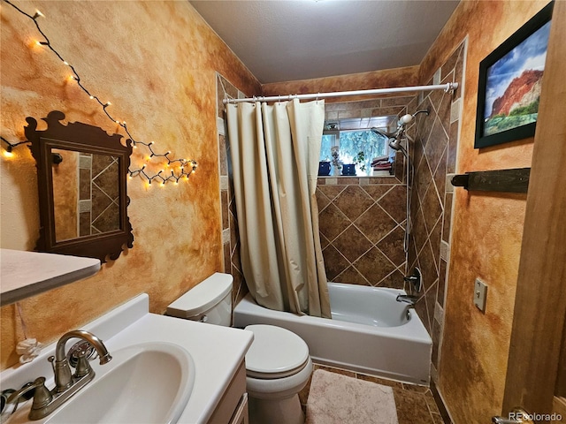 232 N 14th St, Colorado Springs, CO 80904 - full bath featuring a textured wall, toilet, shower / bath combo, vanity, and stone finish floors