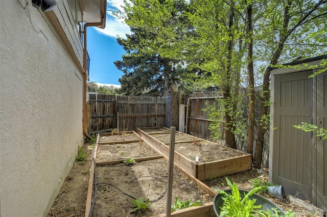 232 N 14th St, Colorado Springs, CO 80904 - view of yard with a garden and fence