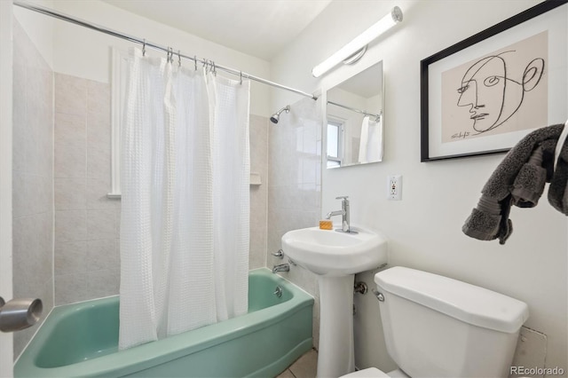 bathroom with toilet and shower / tub combo