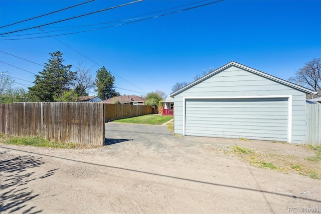 detached garage with fence