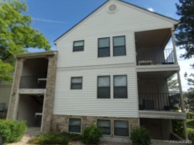 6705 S Field St Unit 802, Littleton, CO 80128 - back of house featuring a balcony