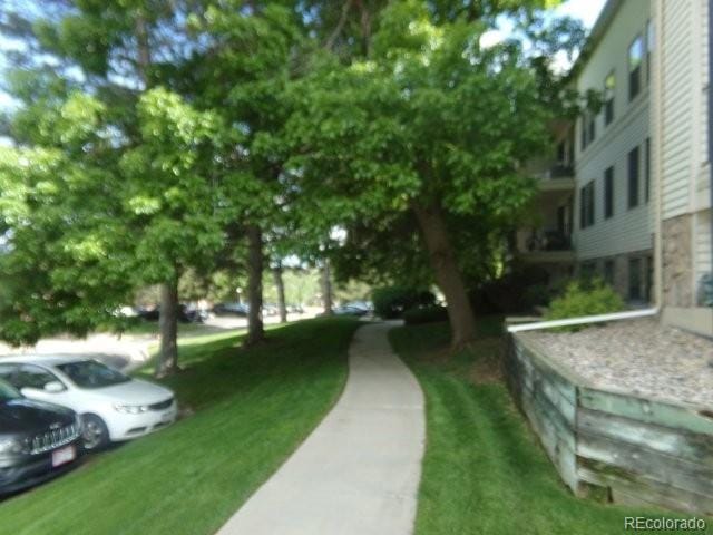 6705 S Field St Unit 802, Littleton, CO 80128 - view of home's community featuring a lawn