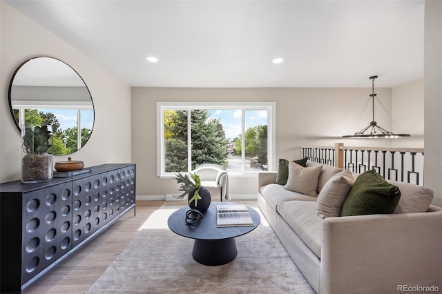 13249 W Jewell Pl, Lakewood, CO 80228 - living area with light wood finished floors and recessed lighting