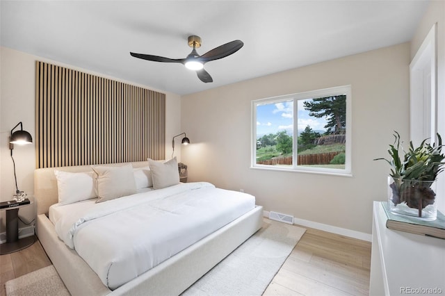 13249 W Jewell Pl, Lakewood, CO 80228 - bedroom featuring wood finished floors and ceiling fan