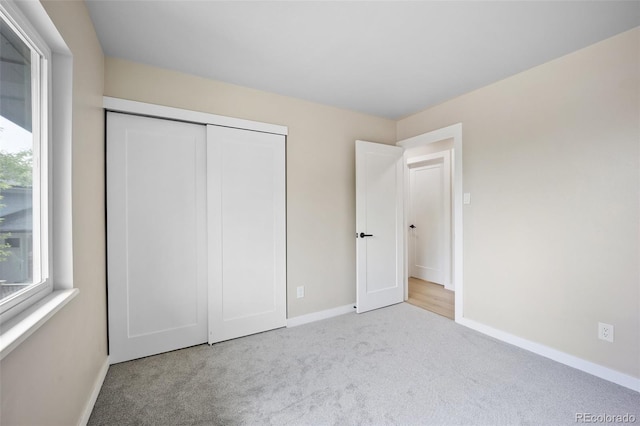 13249 W Jewell Pl, Lakewood, CO 80228 - unfurnished bedroom featuring carpet and a closet