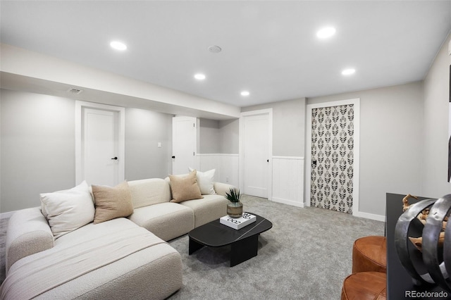 13249 W Jewell Pl, Lakewood, CO 80228 - carpeted living room featuring recessed lighting and wainscoting