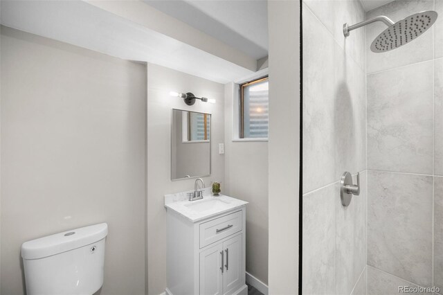 13249 W Jewell Pl, Lakewood, CO 80228 - full bathroom featuring vanity and a tile shower