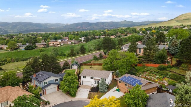 13249 W Jewell Pl, Lakewood, CO 80228 - aerial perspective of suburban area with a mountainous background