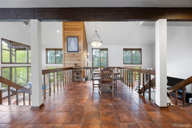 3900 Bogey Ct, Longmont, CO 80503 - dining room with beamed ceiling and dark tile patterned flooring