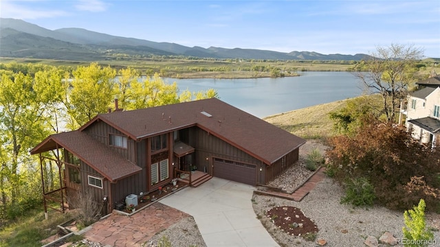 3900 Bogey Ct, Longmont, CO 80503 - aerial view of property and surrounding area with a water and mountain view