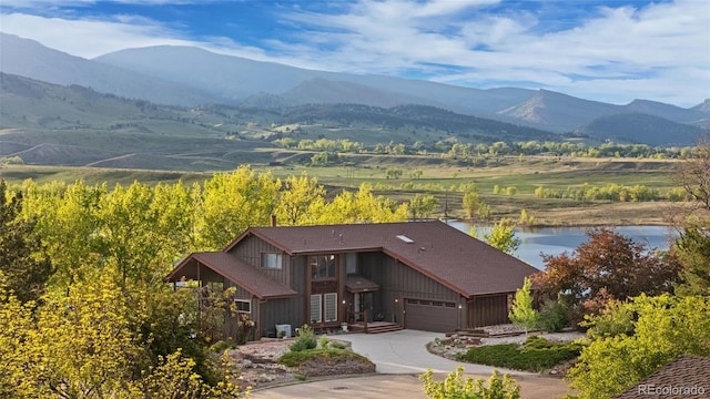 3900 Bogey Ct, Longmont, CO 80503 - view from above of property featuring a water and mountain view