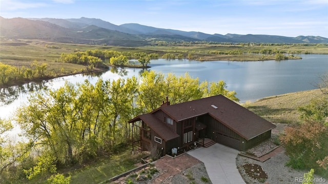 3900 Bogey Ct, Longmont, CO 80503 - view of subject property with a water and mountain view