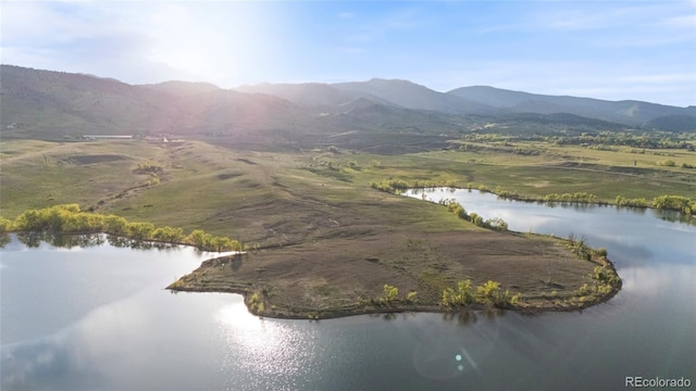 3900 Bogey Ct, Longmont, CO 80503 - aerial overview of property's location with a water and mountain view