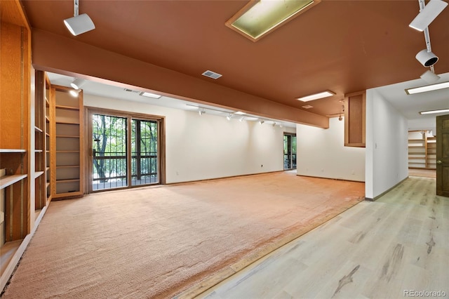 3900 Bogey Ct, Longmont, CO 80503 - unfurnished room featuring plenty of natural light and light wood-style floors