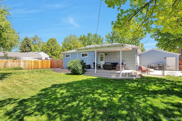 6179 S Bemis St, Littleton, CO 80120 - rear view of house featuring outdoor lounge area and a patio