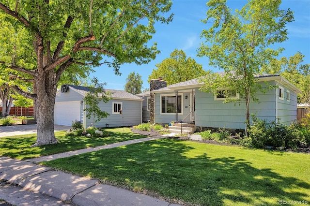 6179 S Bemis St, Littleton, CO 80120 - ranch-style home with a chimney, a front yard, and a garage