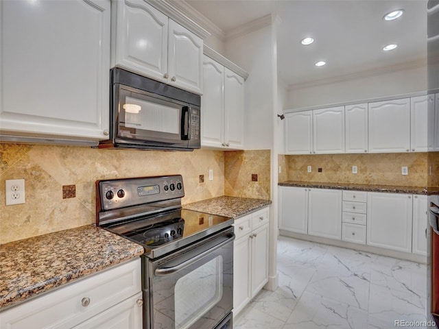 15501 E 112th Ave Unit 35B, Commerce City, CO 80022 - kitchen featuring black appliances, crown molding, dark stone countertops, white cabinets, and recessed lighting