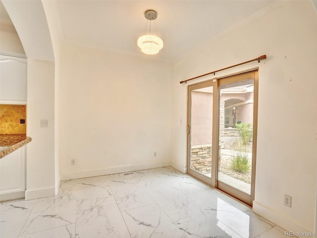 15501 E 112th Ave Unit 35B, Commerce City, CO 80022 - unfurnished dining area featuring light marble finish floors, ornamental molding, and arched walkways