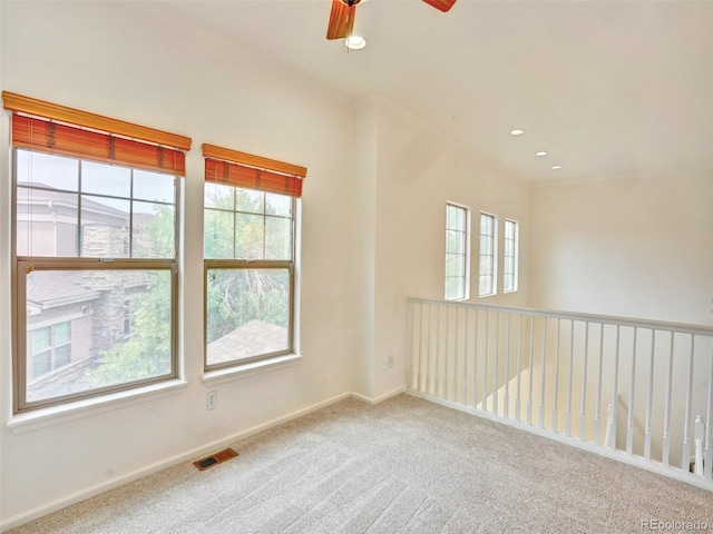 15501 E 112th Ave Unit 35B, Commerce City, CO 80022 - unfurnished room with healthy amount of natural light, carpet, ceiling fan, recessed lighting, and ornamental molding