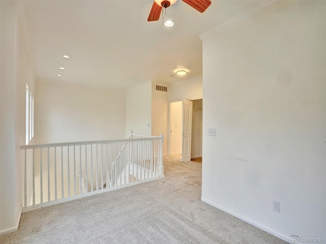15501 E 112th Ave Unit 35B, Commerce City, CO 80022 - carpeted empty room with ceiling fan, recessed lighting, and crown molding